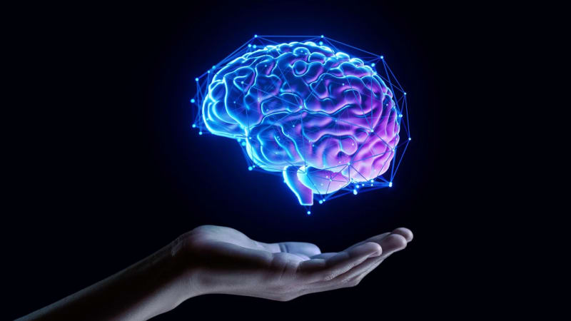 Illustration of healthy neurons connecting and communicating in an aging brain