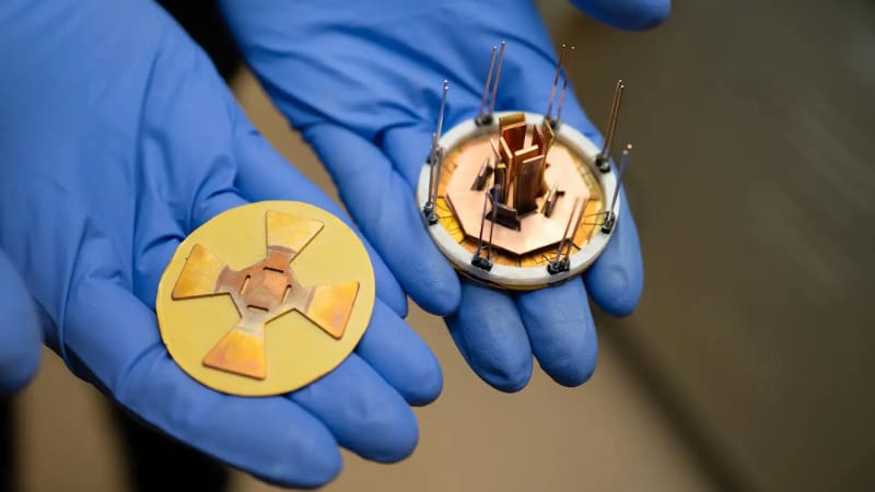 Octagonal disk-shaped power module shown against neutral background at National Renewable Energy Laboratory