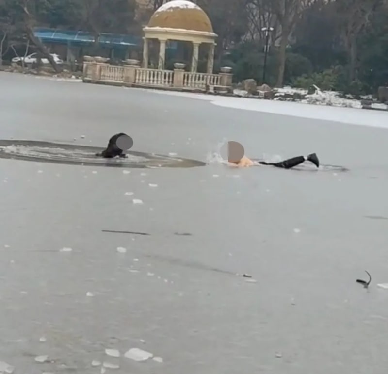 Dad Dives Into Frozen Lake to Save Stranger's Son - Image 3