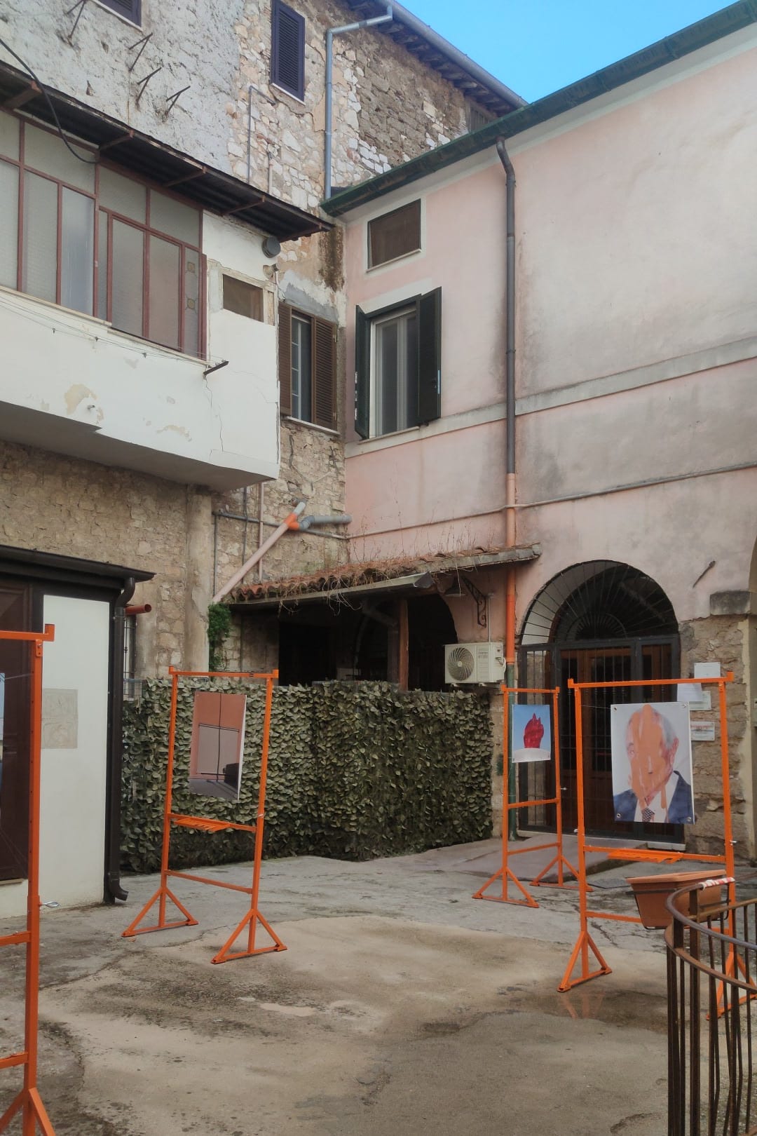 The frames installed in the old town courtyard, before opening