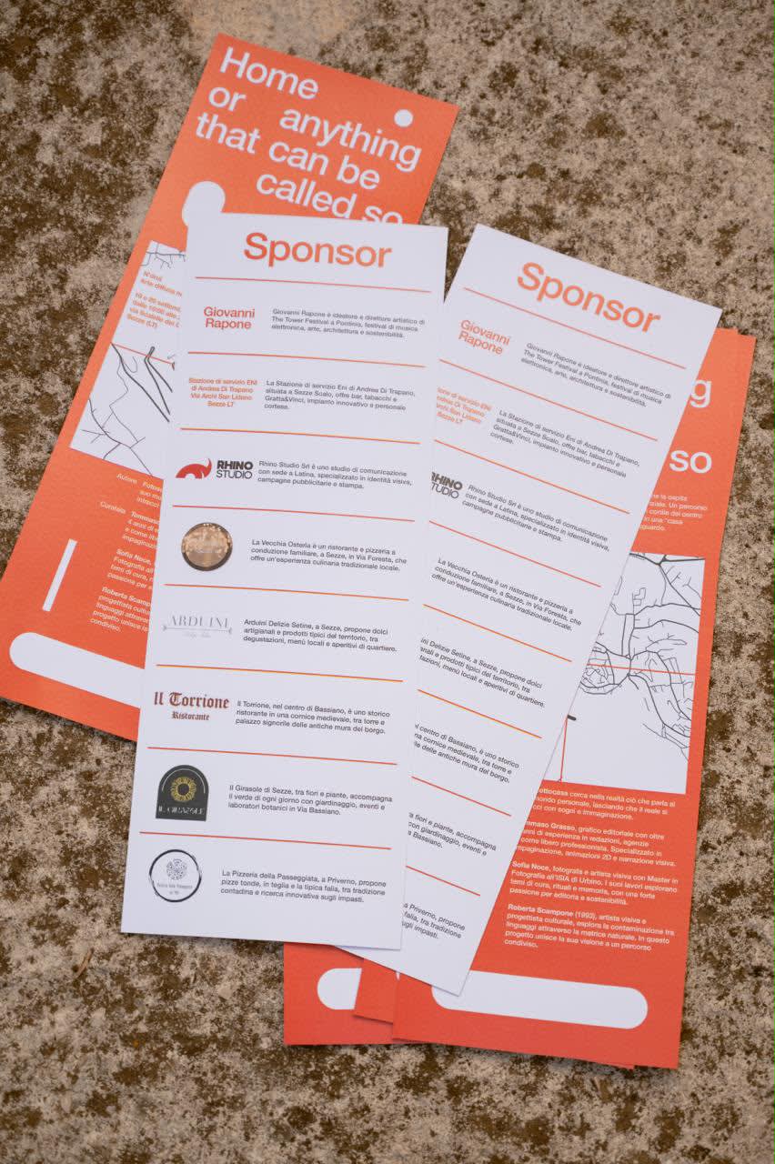 The exhibition leaflets open on the sponsor pages