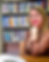 Rita Thorn Smiling with books behind her