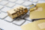 Golden Lock laying on keyboard