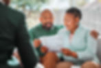Lovely couple looking at credit report together