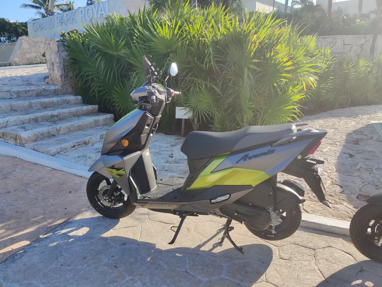 Suzuki Avenis scooter parking along Grand Park Royal Hotel Zone Cancun