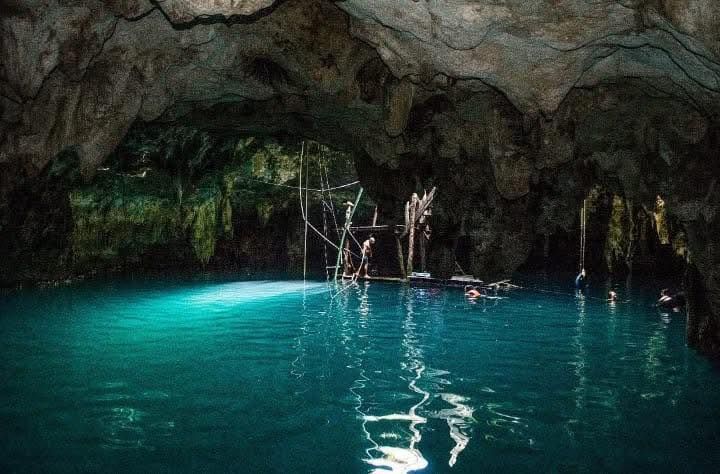 Sunlight entering Cenote La Noria cave system near Puerto Morelos