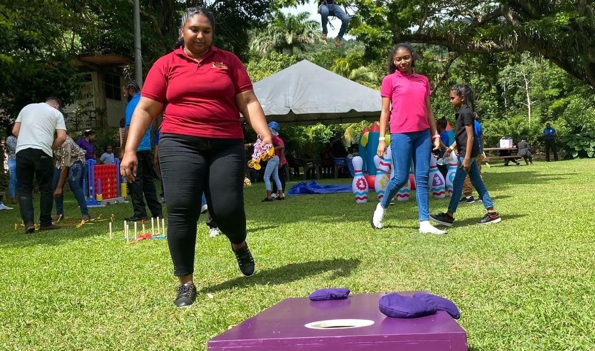 Miss Maharaj and Etana at the cornball game area.
