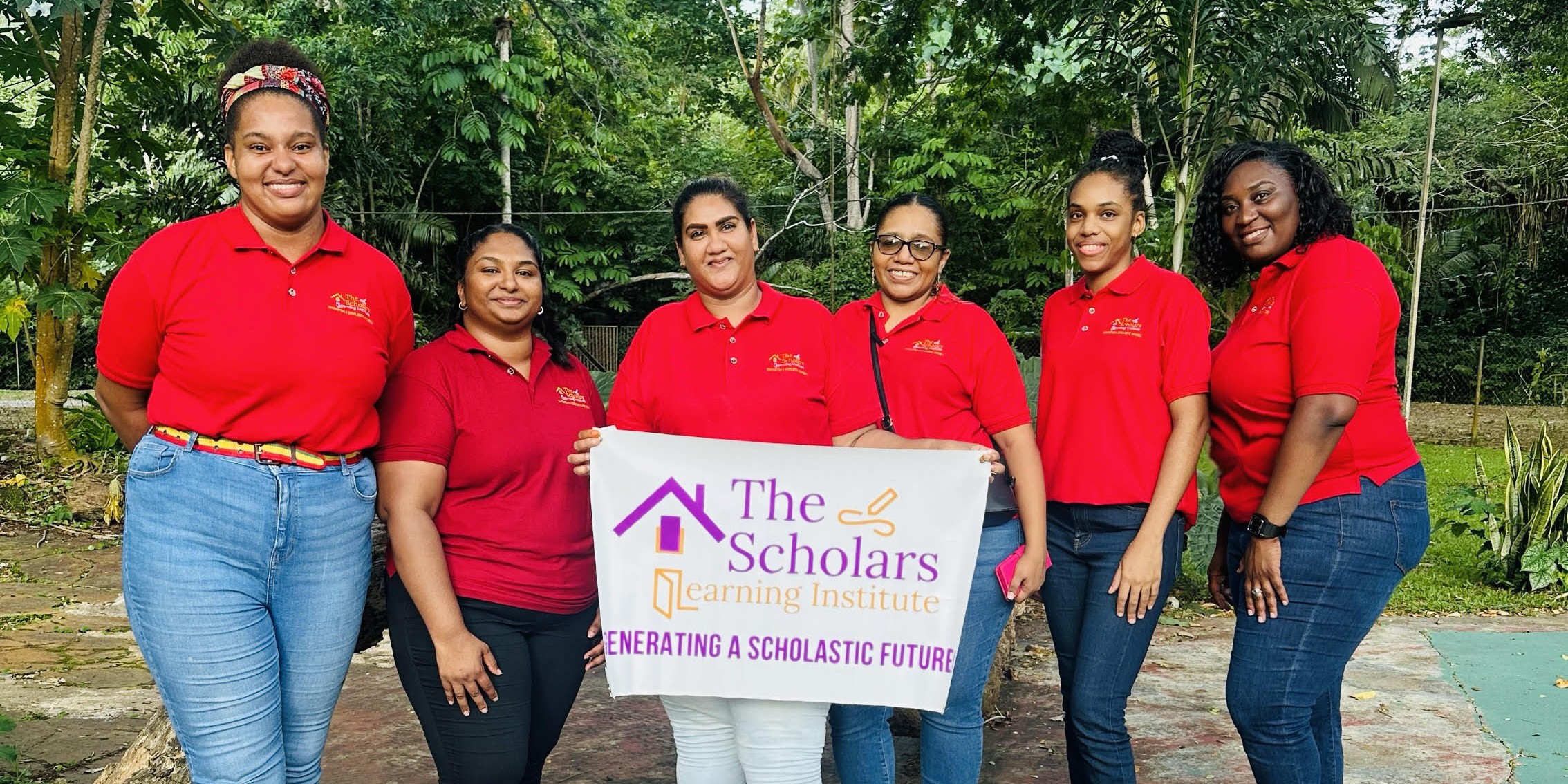 The principal and some of the teachers at Zip-ITT