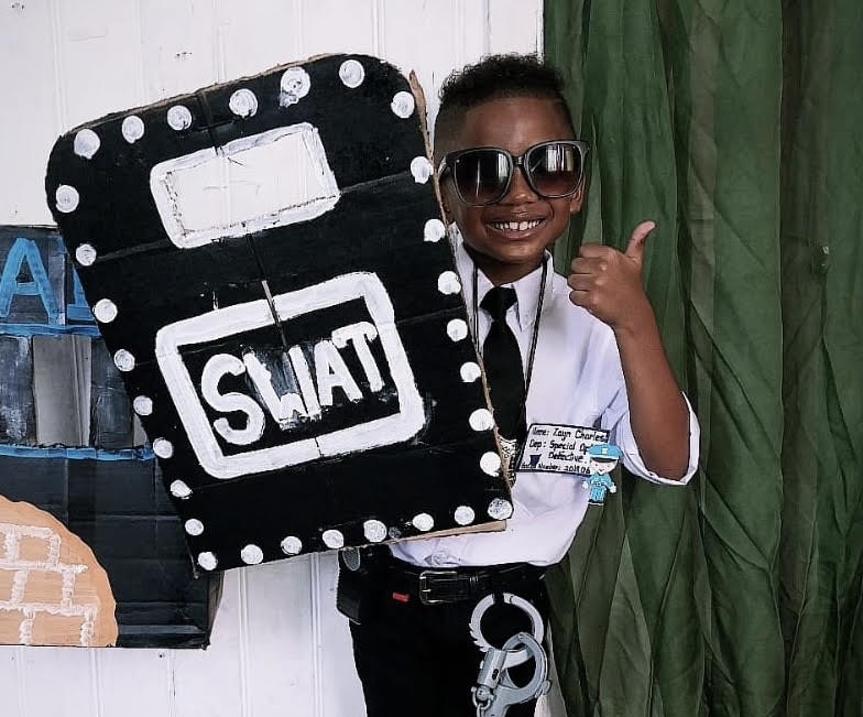 Zayn as a member of the SWAY Team.