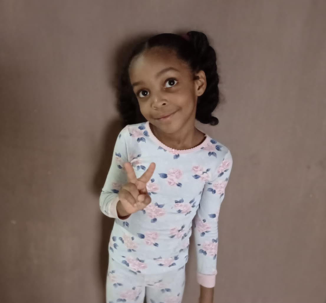 Itarah in her pajamas.