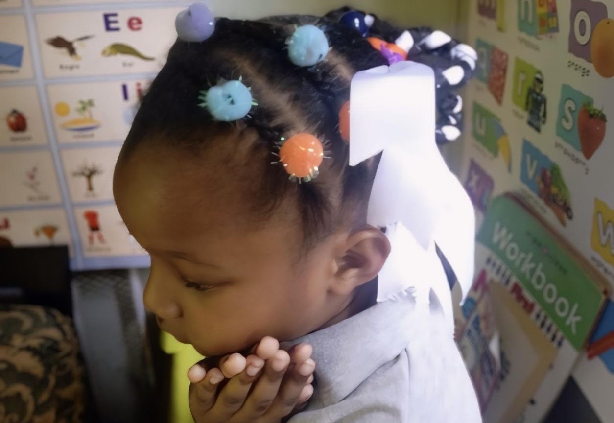 Ora in her crazy hairstyle.