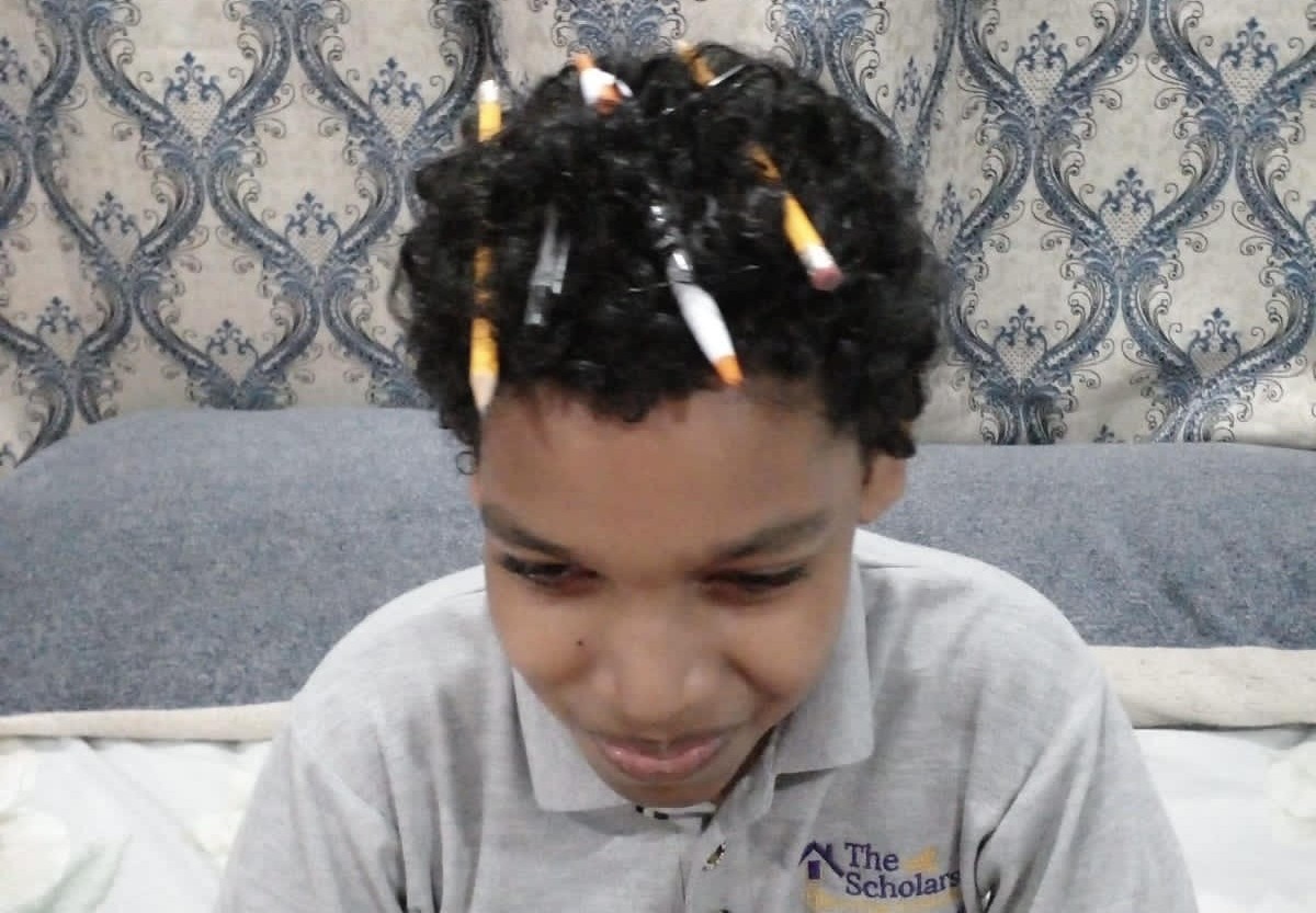 Kai in his crazy hairstyle.