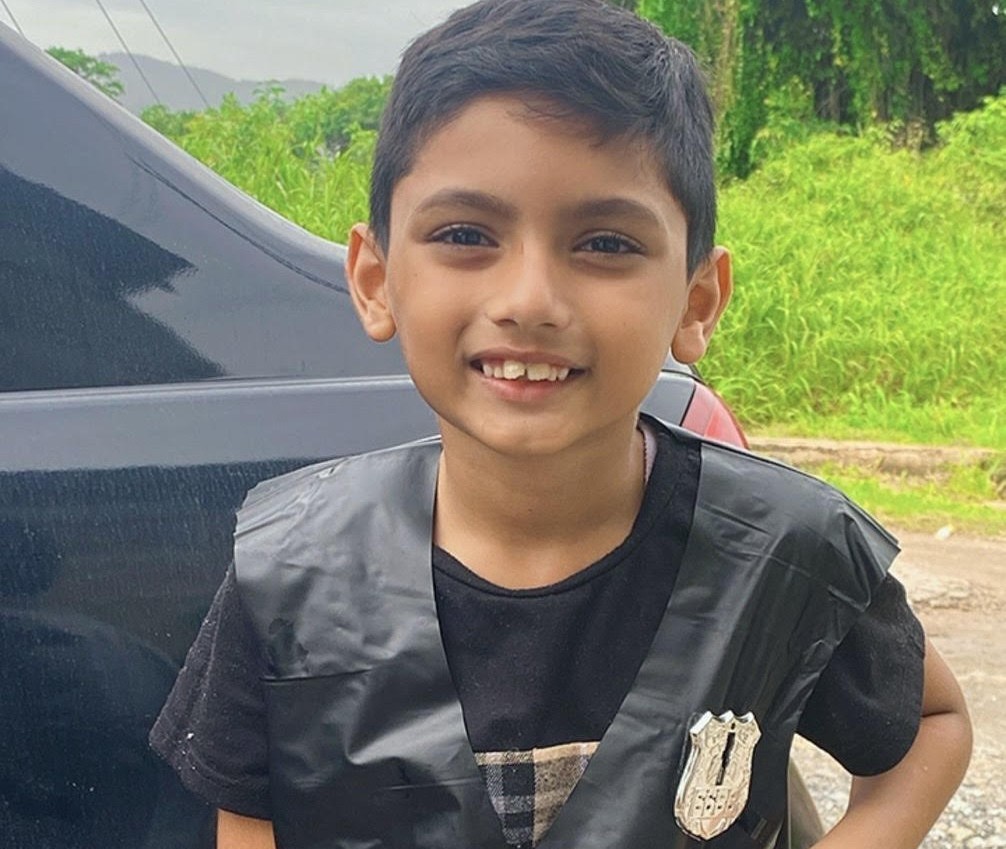 Zayn as a police officer.