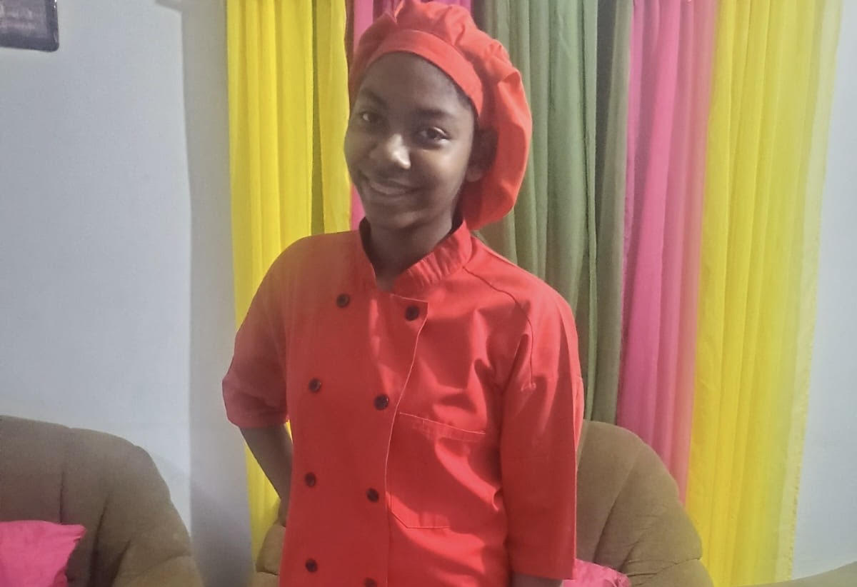 Etana as a chef.