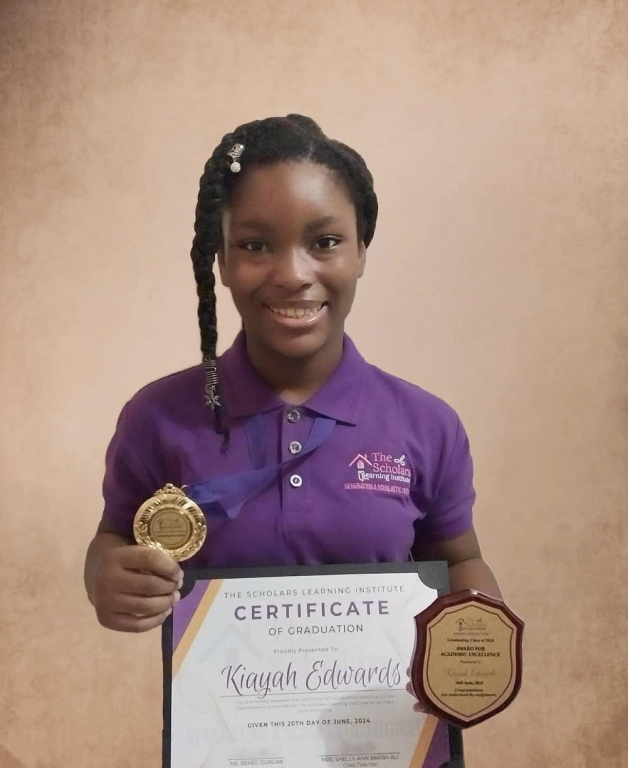 Kiayah on STD 5 graduation day.