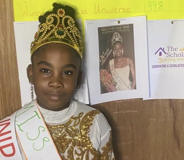 Kimesha as Miss Universe Wendy Fitzwilliam.