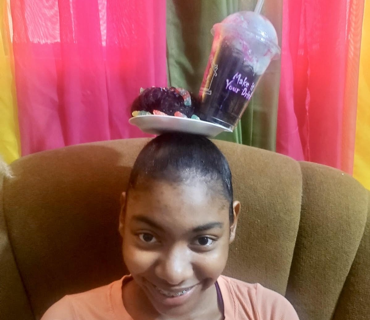 Etana in her crazy hairstyle.