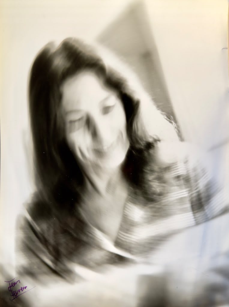 Jean Ferrero gelatin silver print showing woman with long dark hair captured in intentional motion blur, signed vintage photo