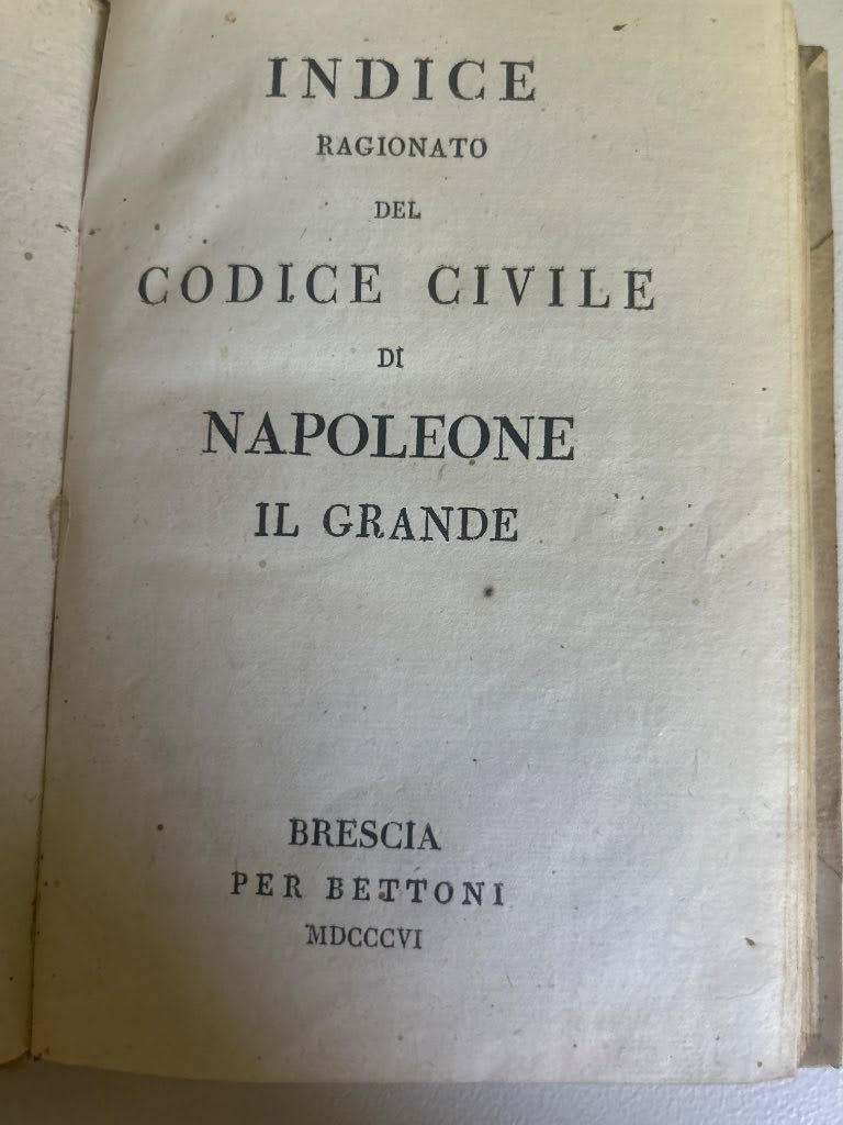 1806 octavo volume in original paper wrappers showing Napoleonic legal index title page with Bettoni press imprint and dedica