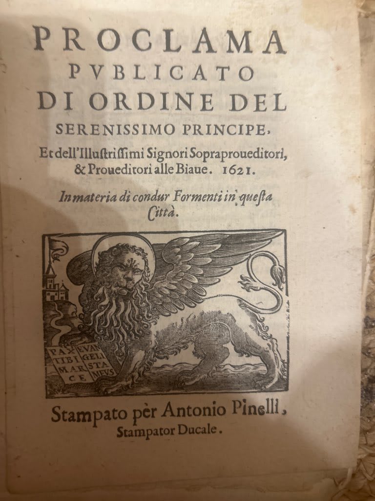 Seventeenth-century Venetian proclamation frontispiece with woodcut of the striding Lion of Saint Mark holding open book