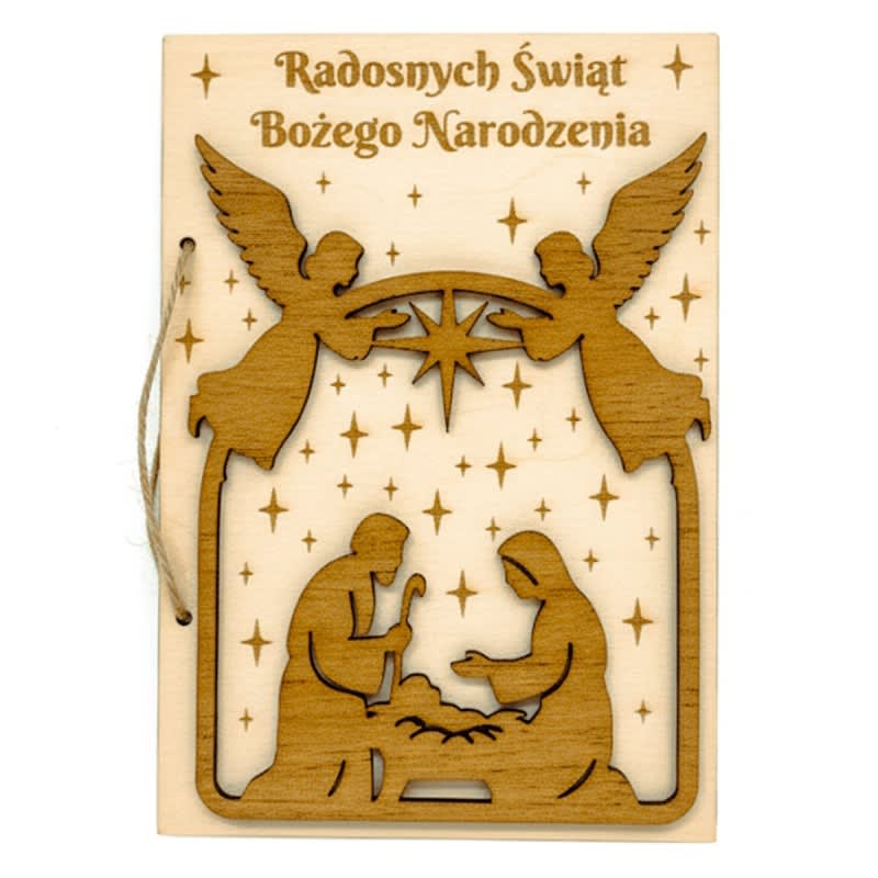 Drewniana kartka świąteczna z grawerowaną sceną betlejemską i napisem Radosnych Świąt Bożego Narodzenia