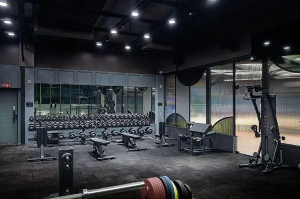 Durable rubber flooring in a gym strength training area