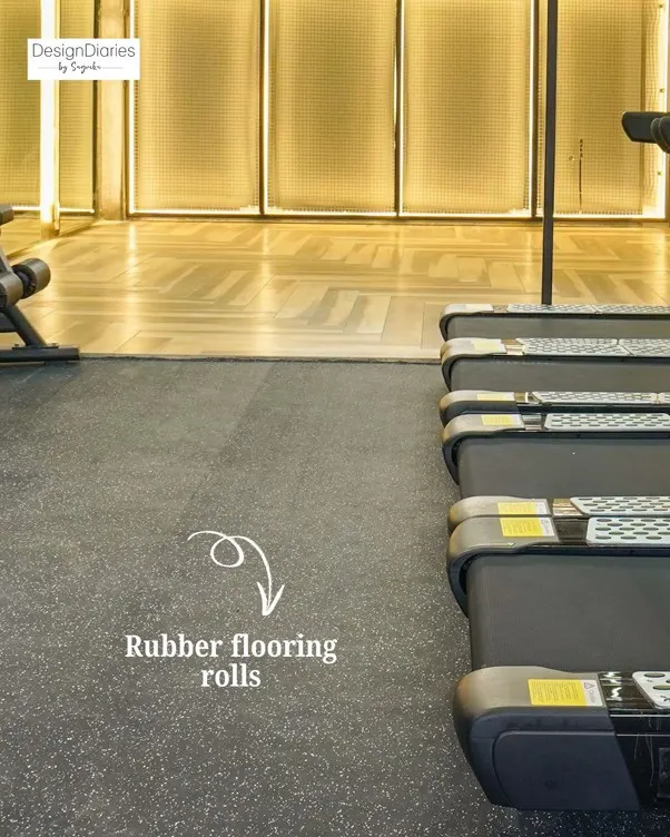 Gym flooring material detail showing texture and floor transition