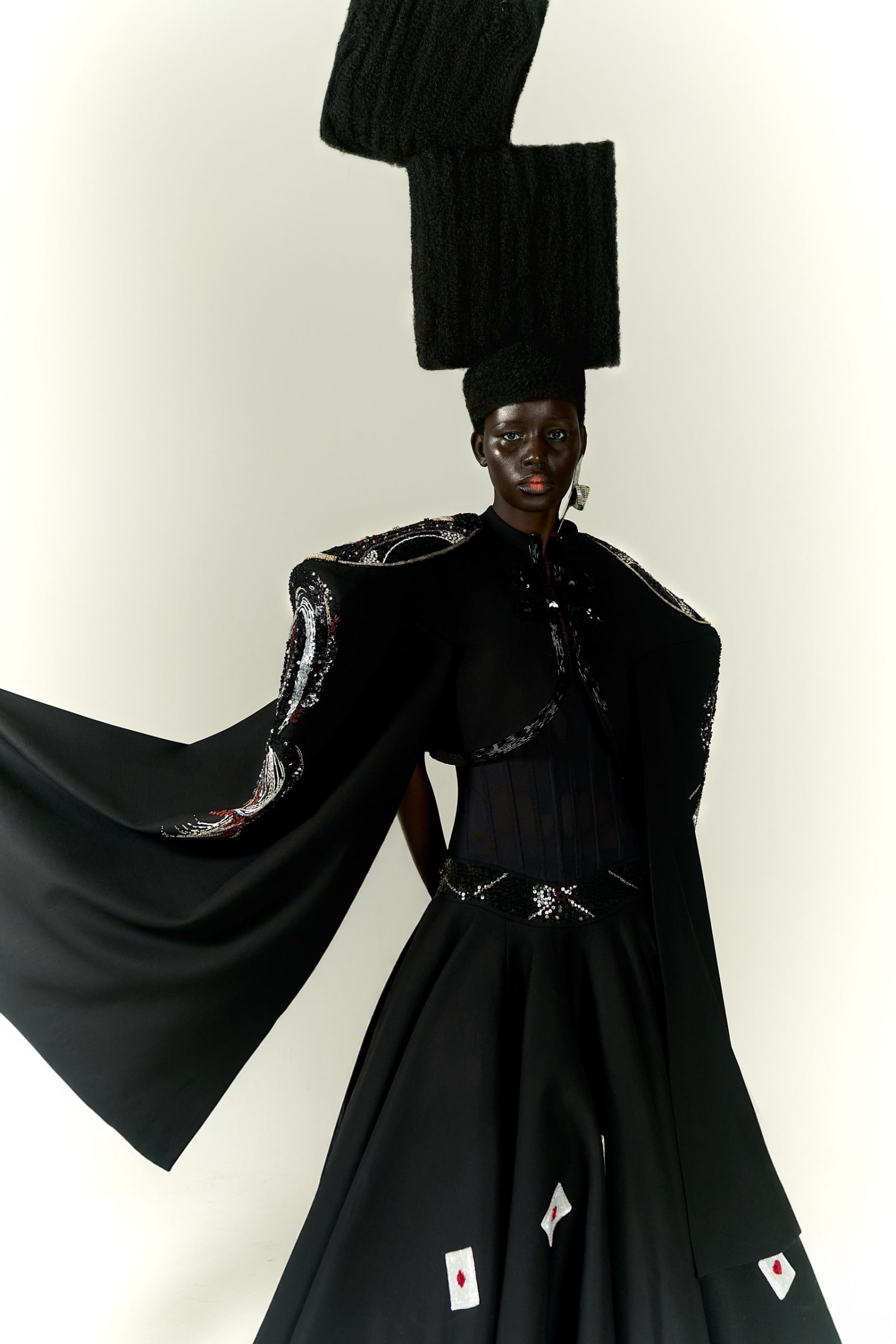 Dress by HOMOLOG, jewelry by SAINT LAURENT