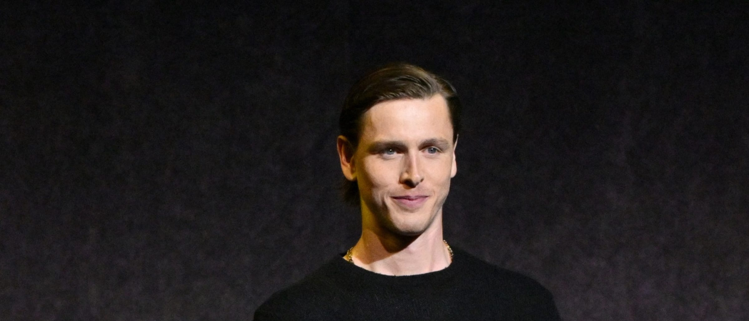 Harris Dickinson Arrives in Style at CinemaCon, Announces John Lennon Role