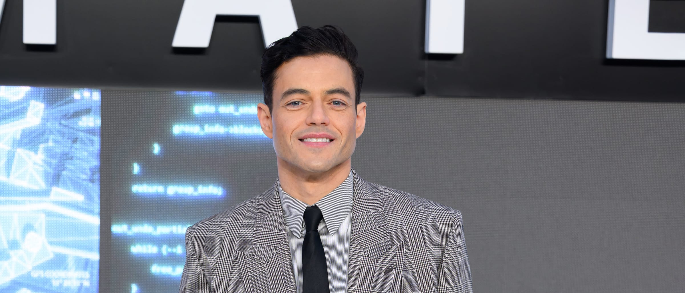Rami Malek Takes 'The Amateur' Press Tour in Style