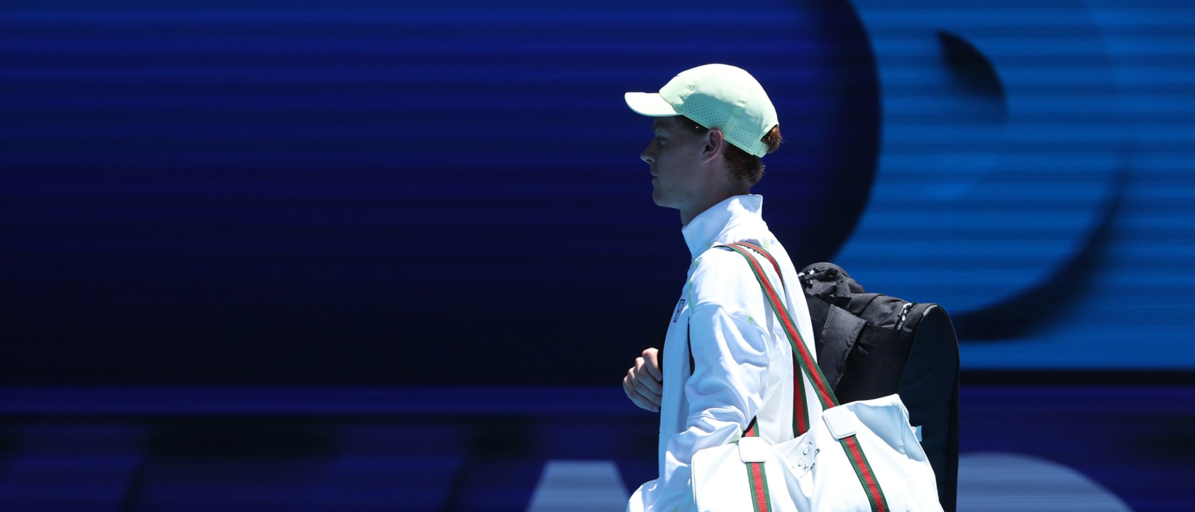 Defending Champion Jannik Sinner Showcases Gucci X HEAD Duffle at Australian Open