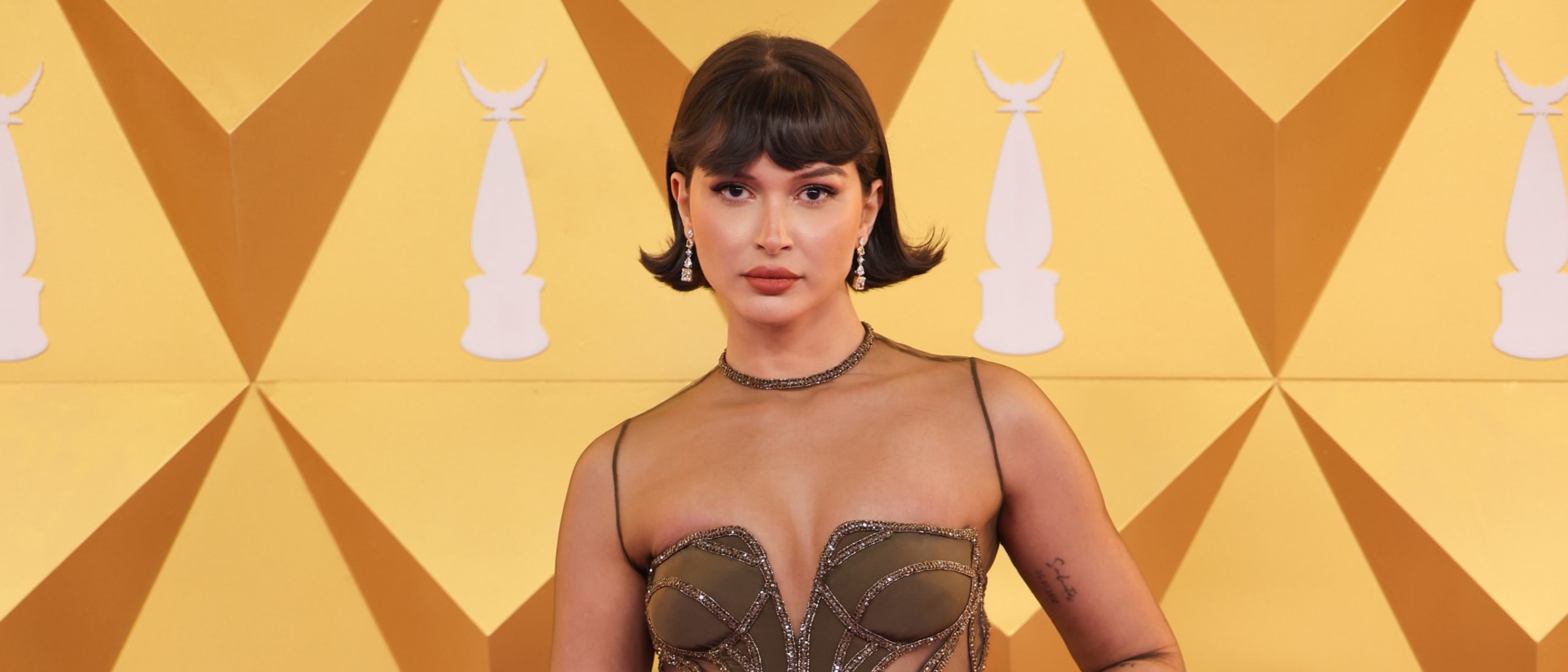 Azza Slimene Commands Joy Awards Red Carpet in Sculptural Versace