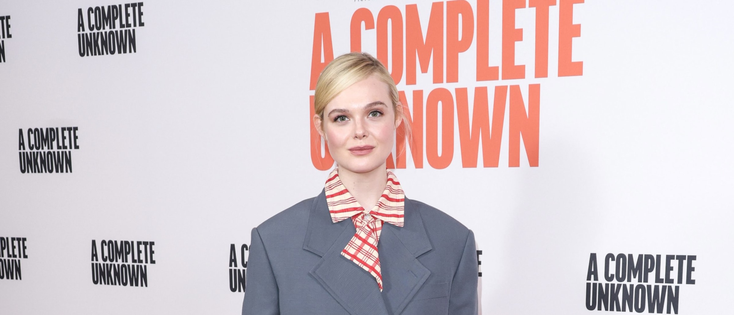 Elle Fanning Gives ‘A Complete Unknown’ a Bottega Veneta Power Suit Spin