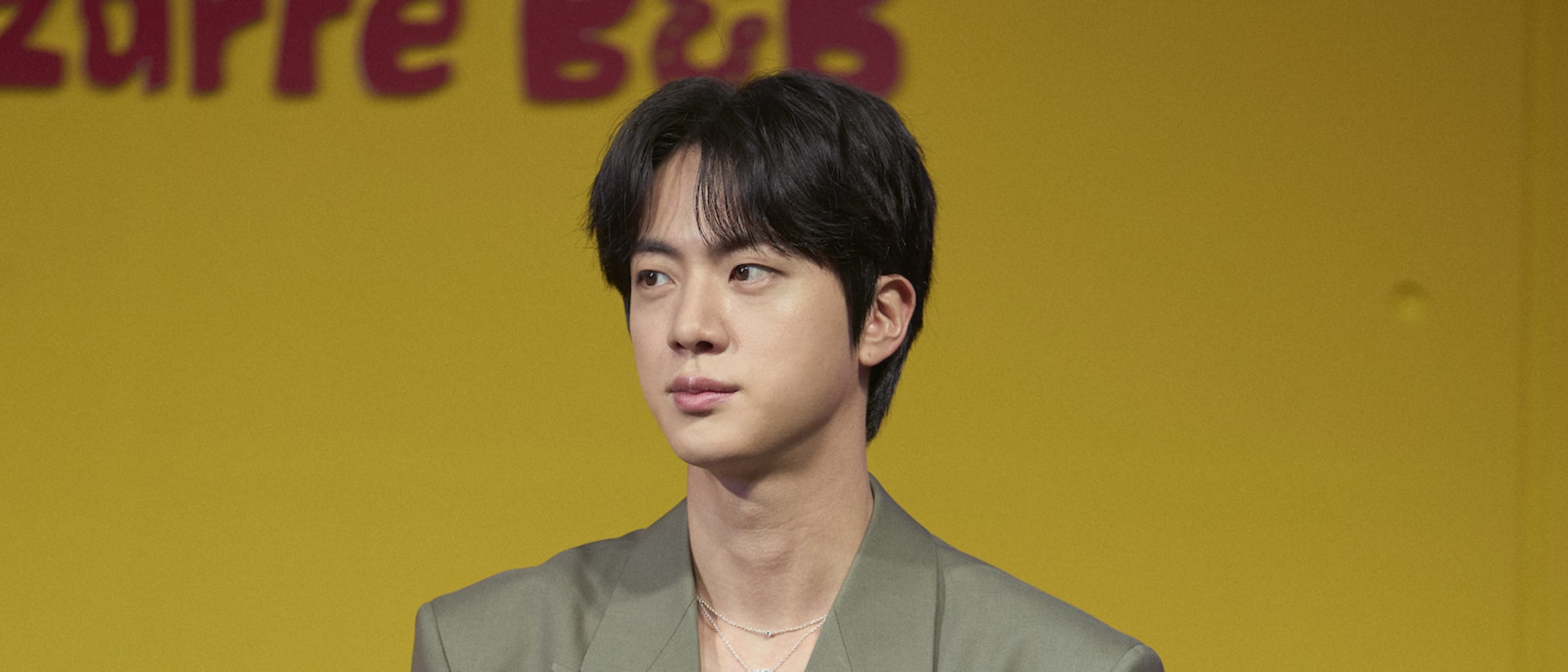Jin of BTS Stuns in Gucci at Kian’s Bizarre B&B Press Conference