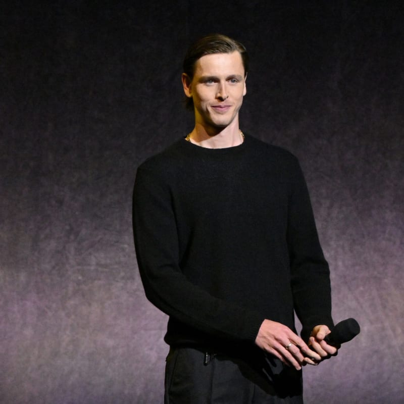 Harris Dickinson Arrives in Style at CinemaCon, Announces John Lennon Role