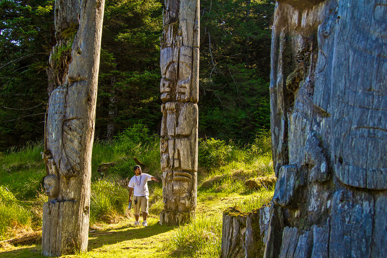Haida Watchman Telling the Story of a SGang Gwaay Totem Pole