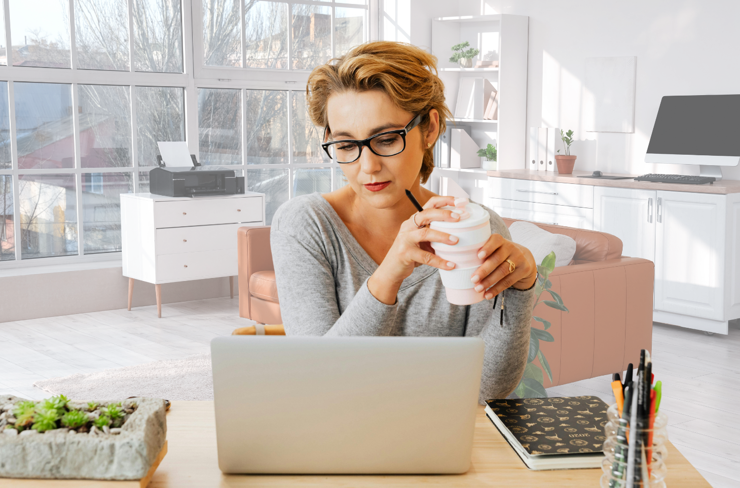 Women's health coach working on email strategy