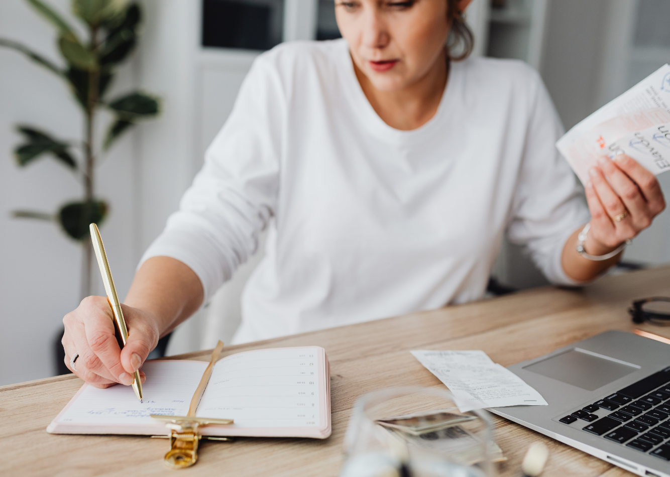 Woman balancing a busy schedule while considering whether to move forward with a health coaching program