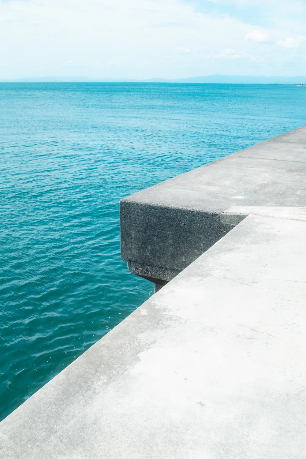 Concrete Pier Teal Water