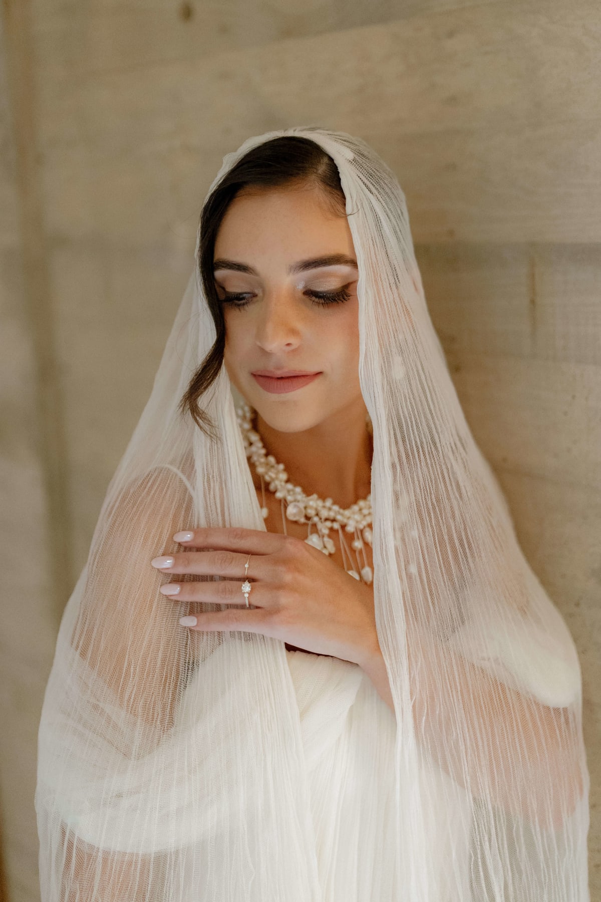 Editorial luxury destination wedding photography capturing the couple against majestic architecture
