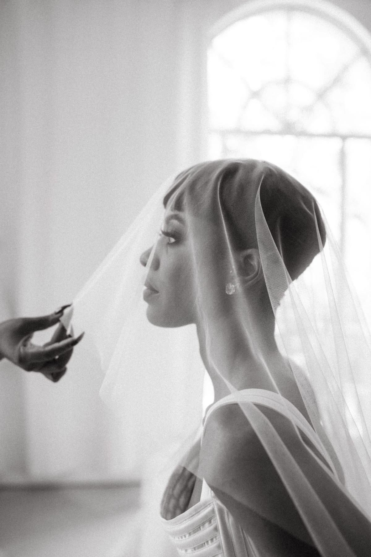 Cinematic fine art wedding portraits capturing an elegant walk of the bride Asiah and groom Gerald