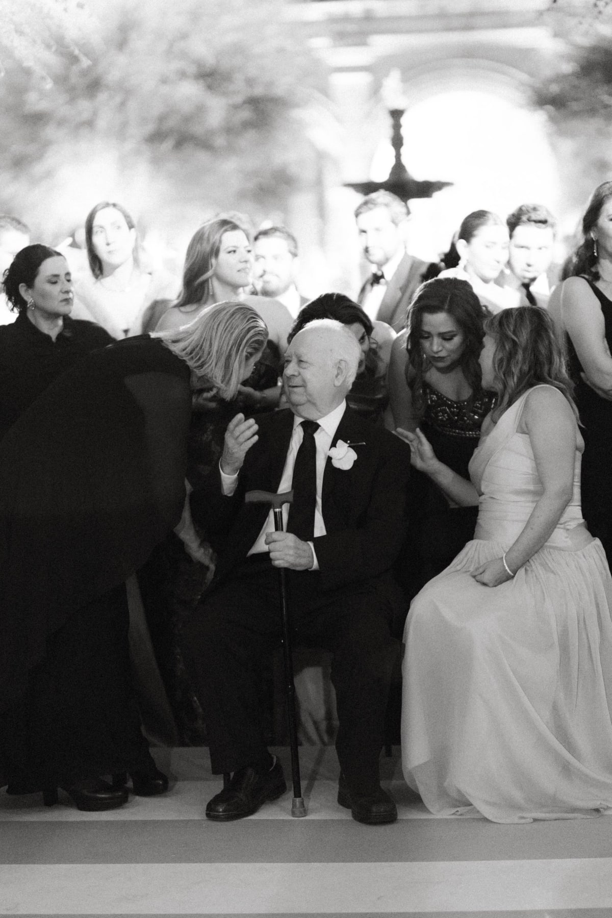 Atmospheric elegant venue details featuring premium event lighting and a modern luxury wedding dance floor