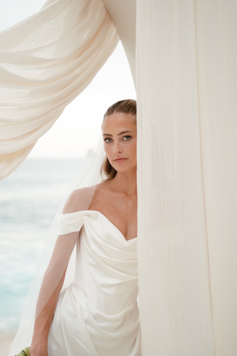 Intimate and timeless fine art wedding portrait capturing the strong affection between Sydney and groom JT