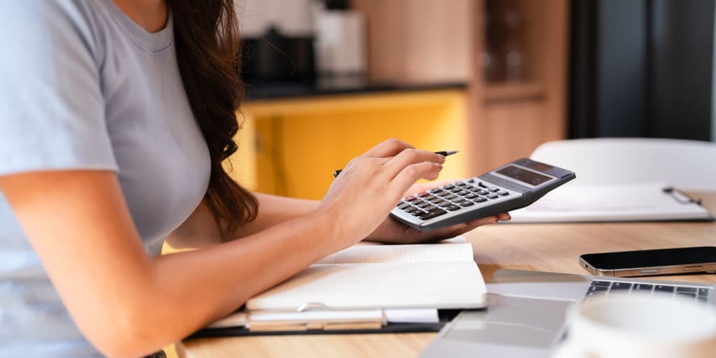 Donna calcola rendimenti