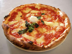 Pizza e bibita sempre più care