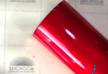 Promo spesial diskon hingga 50% untuk semua produk elektronik dengan latar belakang biru dan ilustrasi shopping bag