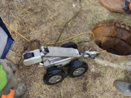 Известную на всю Россию архангельскую дорожную яму ремонтируют с помощью робота