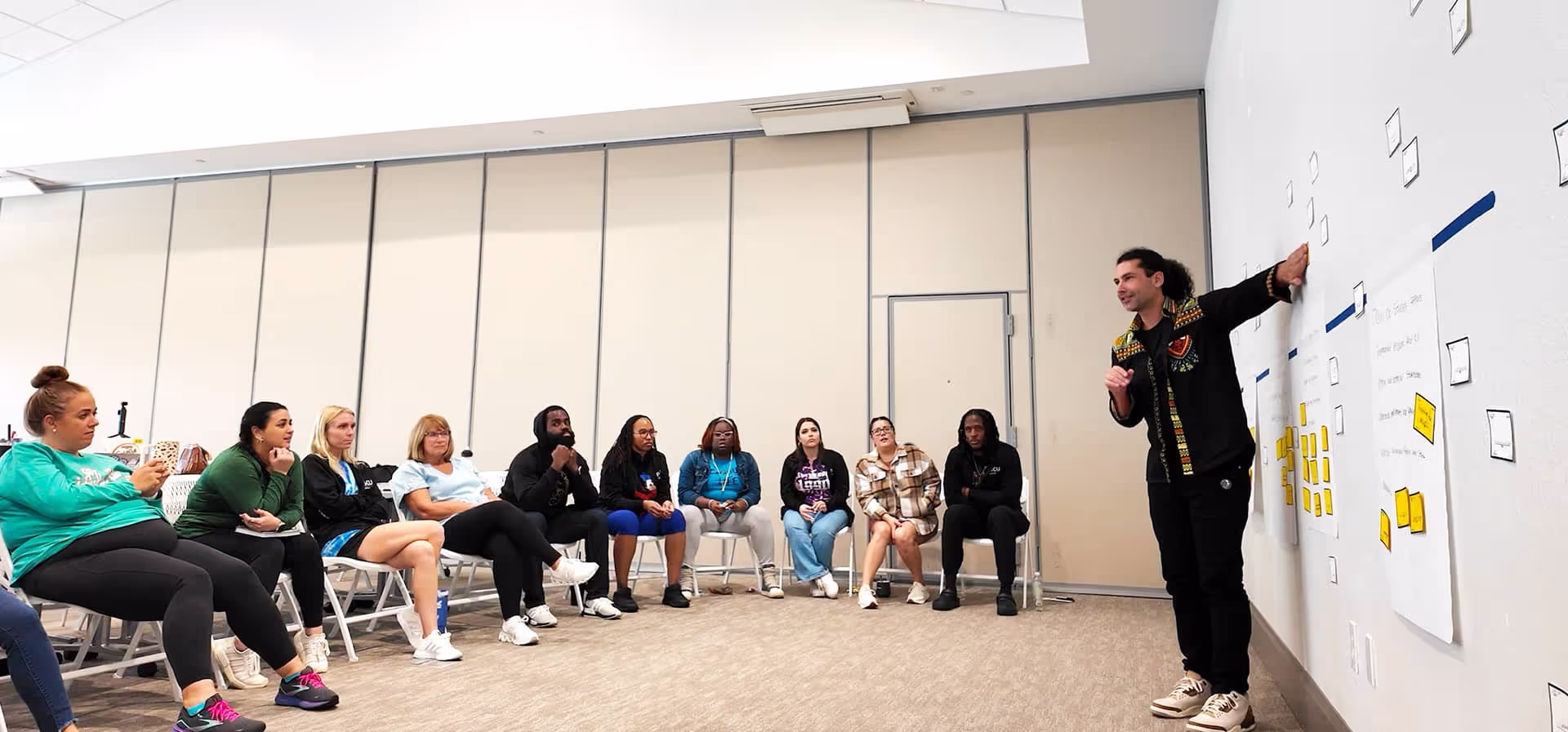 AJ presenting community work