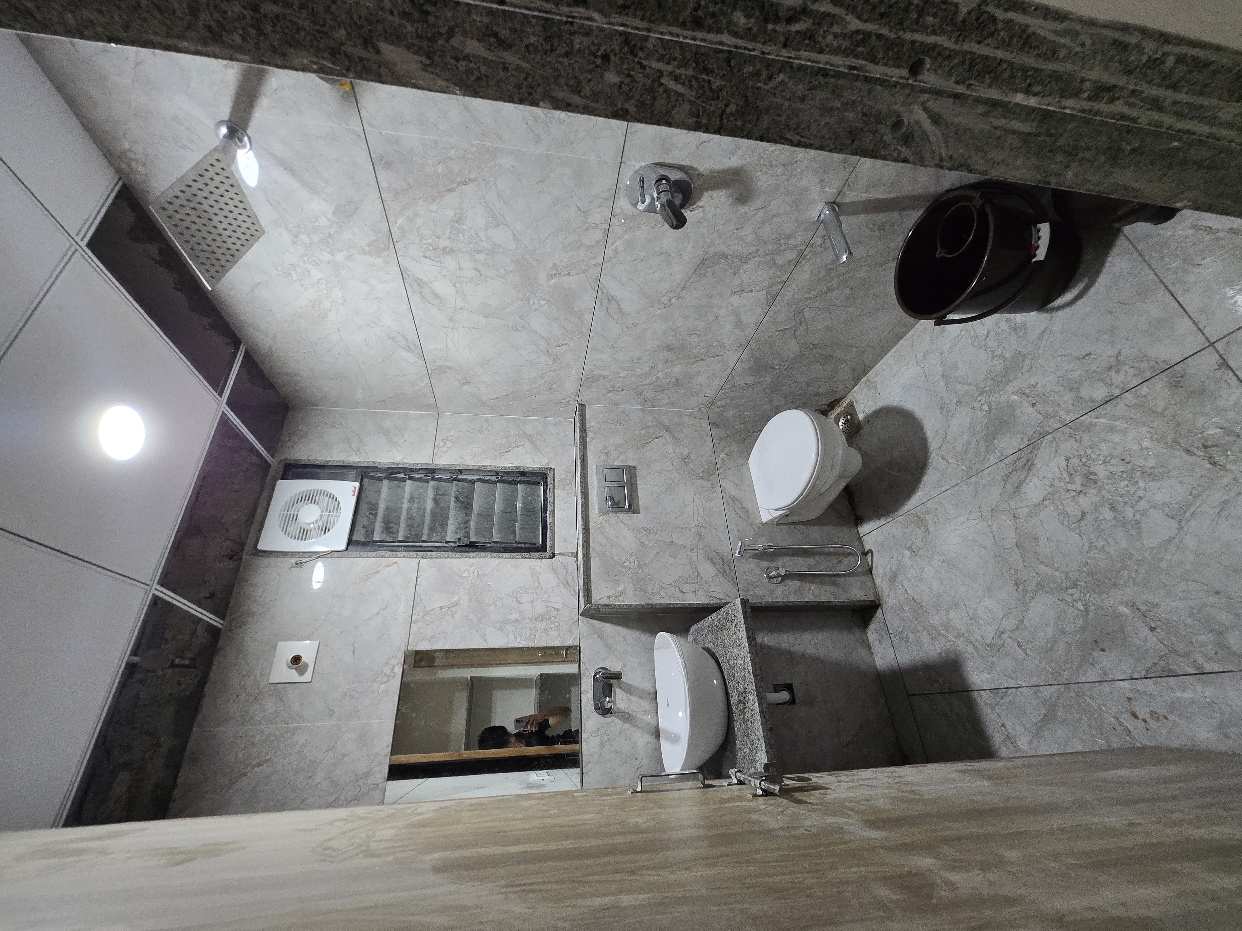 Clean attached bathroom in single room at Mansarovar Girls PG, Navrangpura Ahmedabad
