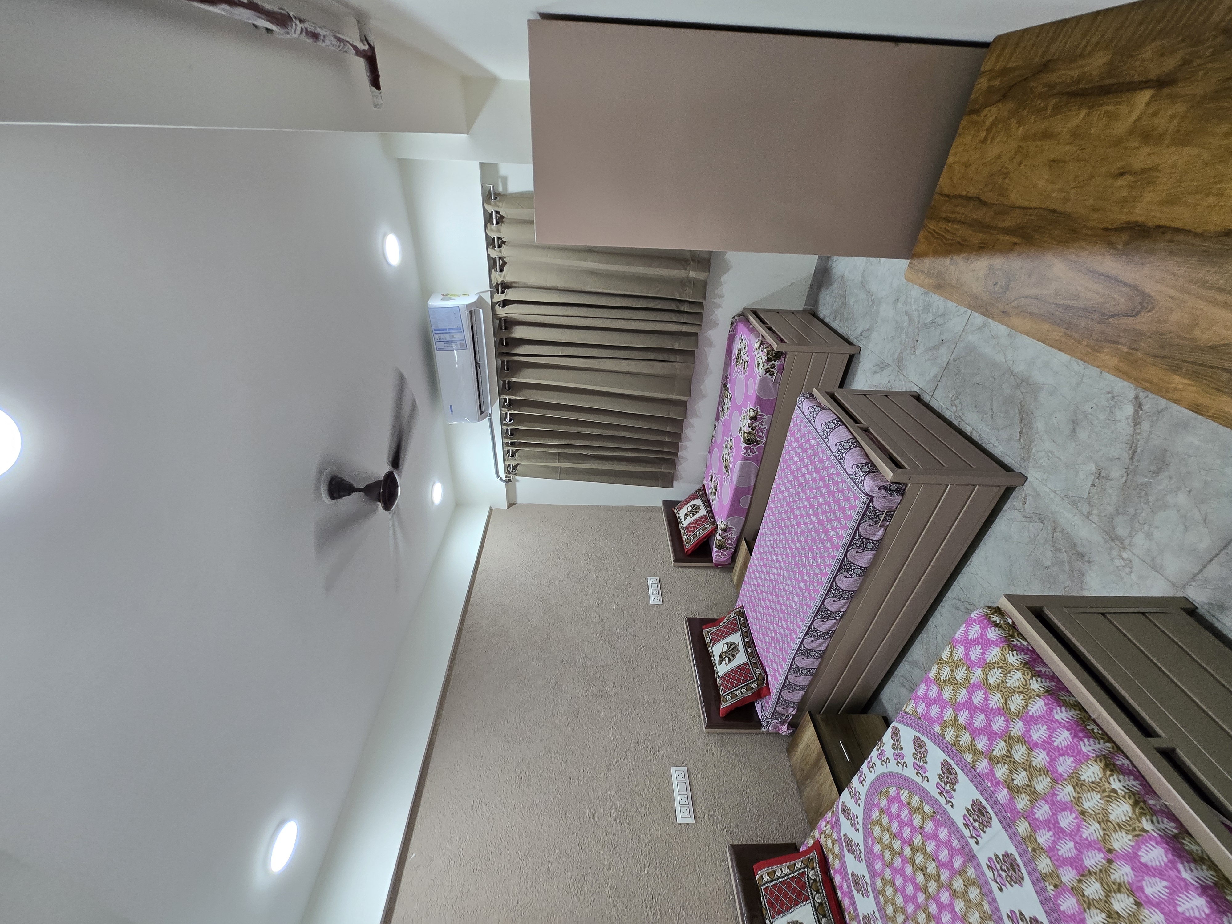 Triple sharing room at Mansarovar Girls PG, budget PG near GLS University Ahmedabad